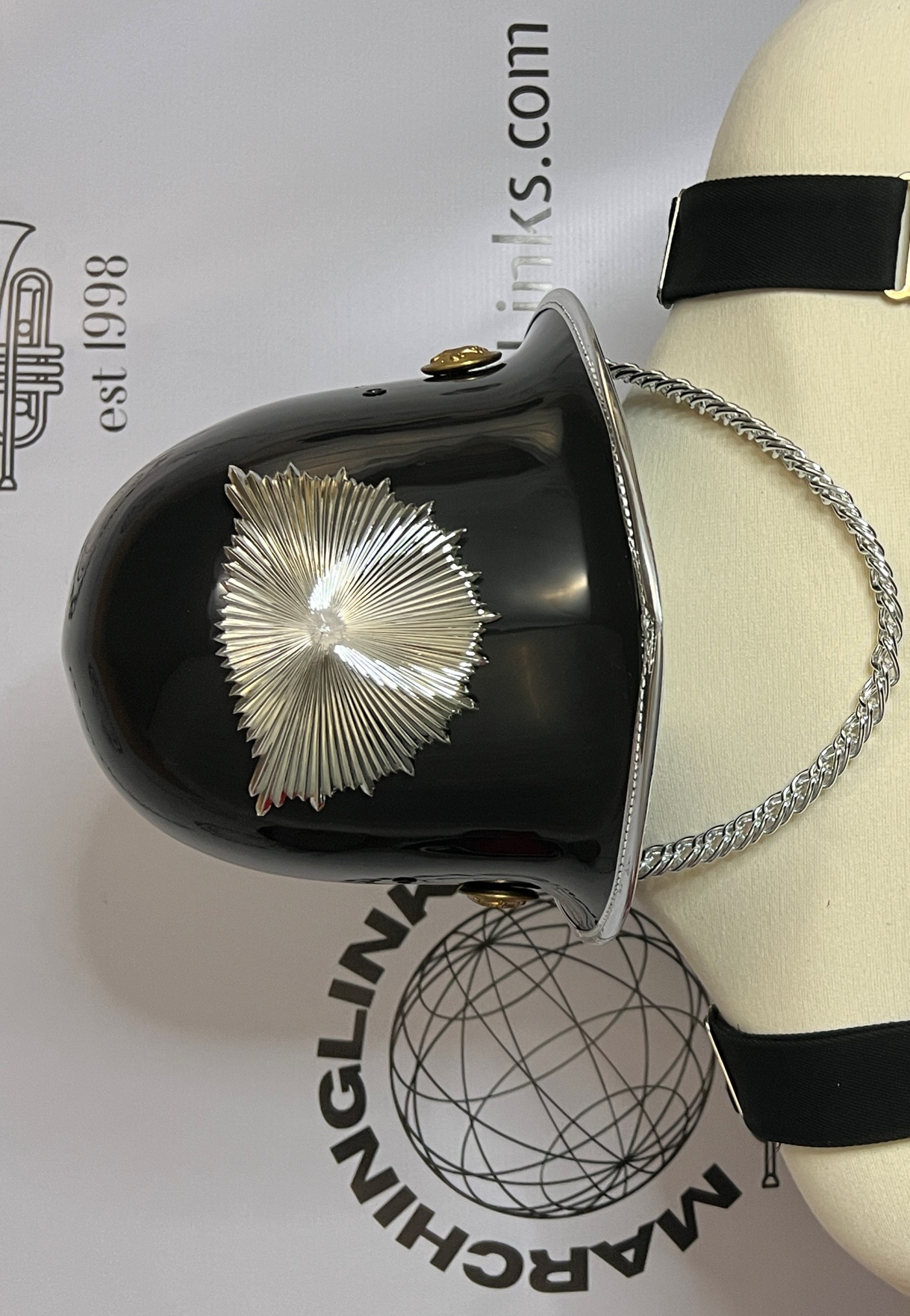 17 Black Marching Band Helmets with Silver Hardware and Gold/Brass Buttons
