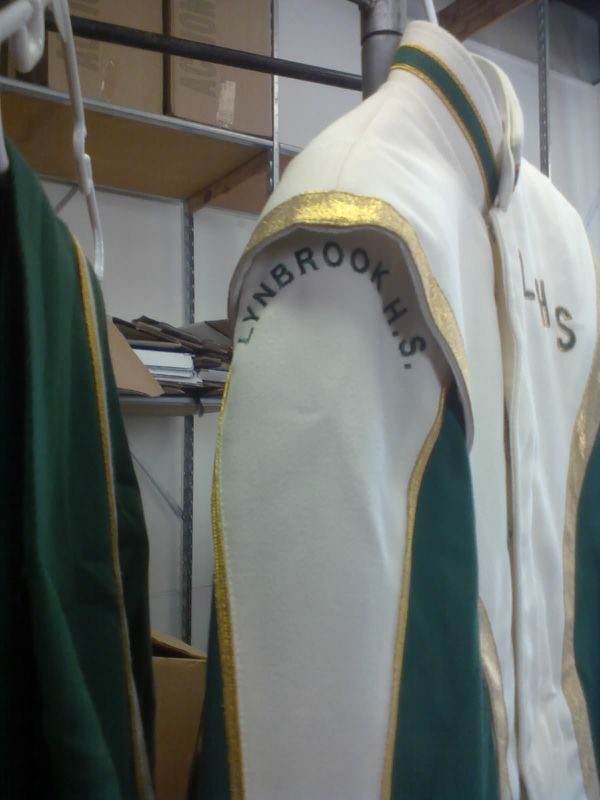 55+/- Green, White and Gold Marching Band Uniforms