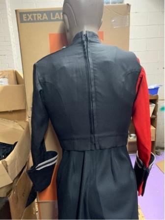 This is a set of 21 red, silver and black used Cesario marching band uniforms. The uniform consists 