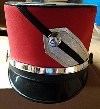 This is a set of 21 red, silver and black used Cesario marching band uniforms. The uniform consists 