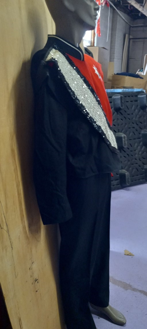 40 Red, White and Black Marching Band Uniforms Item Description: 40 red, white and black used marchi
