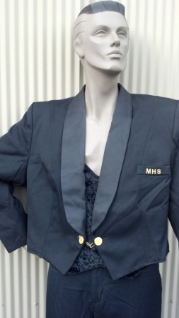 Short, cadet-style jacket, fully lined with single closure. Satin shawl