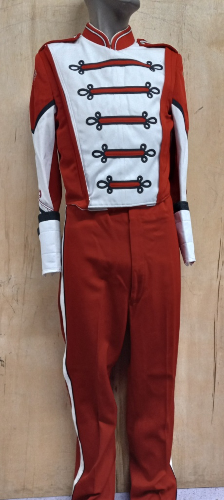 This is a lot of 138+/- red, white and black marching band jackets.