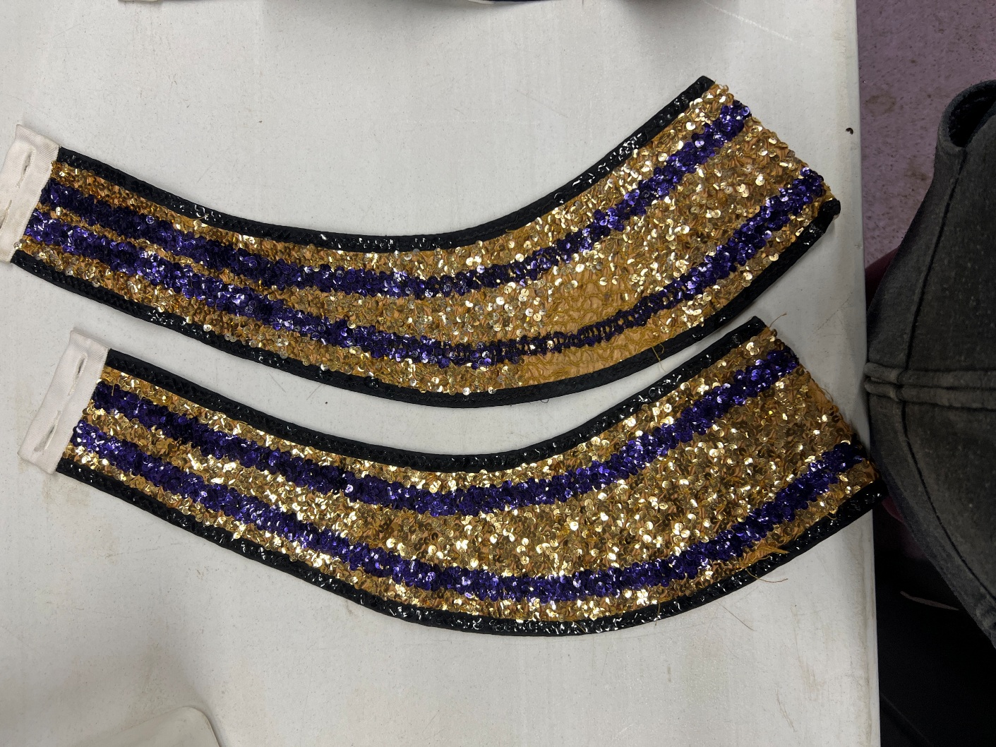 Set of 25 Purple and Gold Sequined Baldrics This is a set of 25 purple and gold sequined b