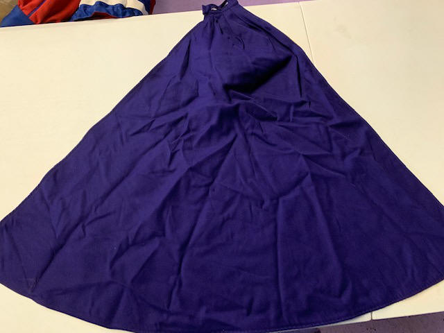Item#0110PurpleGoldCaps010 Item Description: This is a lot of purple and gold/yellow reversible cape