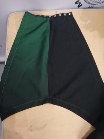 148 Green, Black and White Marching Band Uniforms Including 8 Drum Major Versions