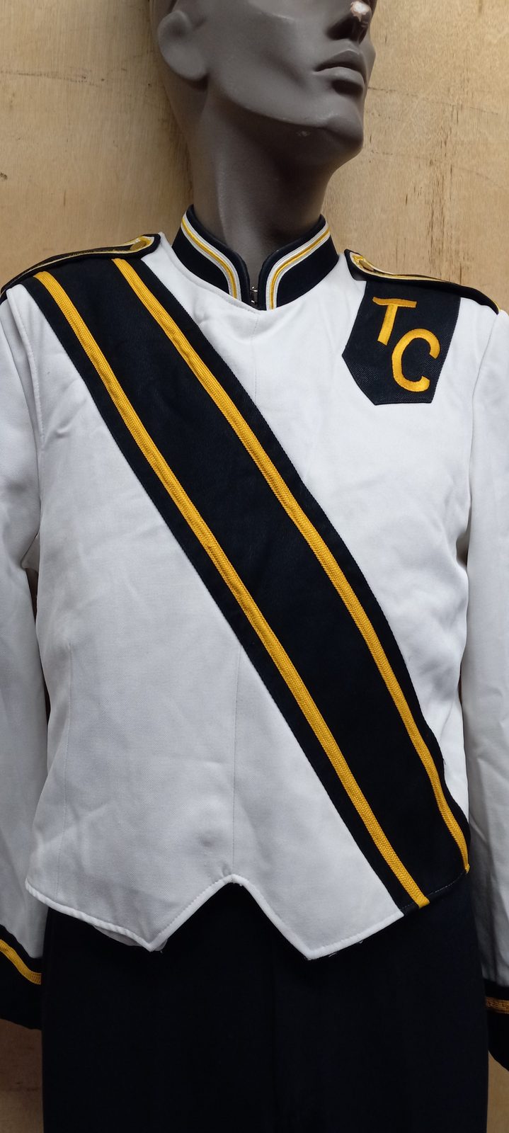 Set of 102+/- Black and White Marching Band jackets with Black Baldric and Gold trim