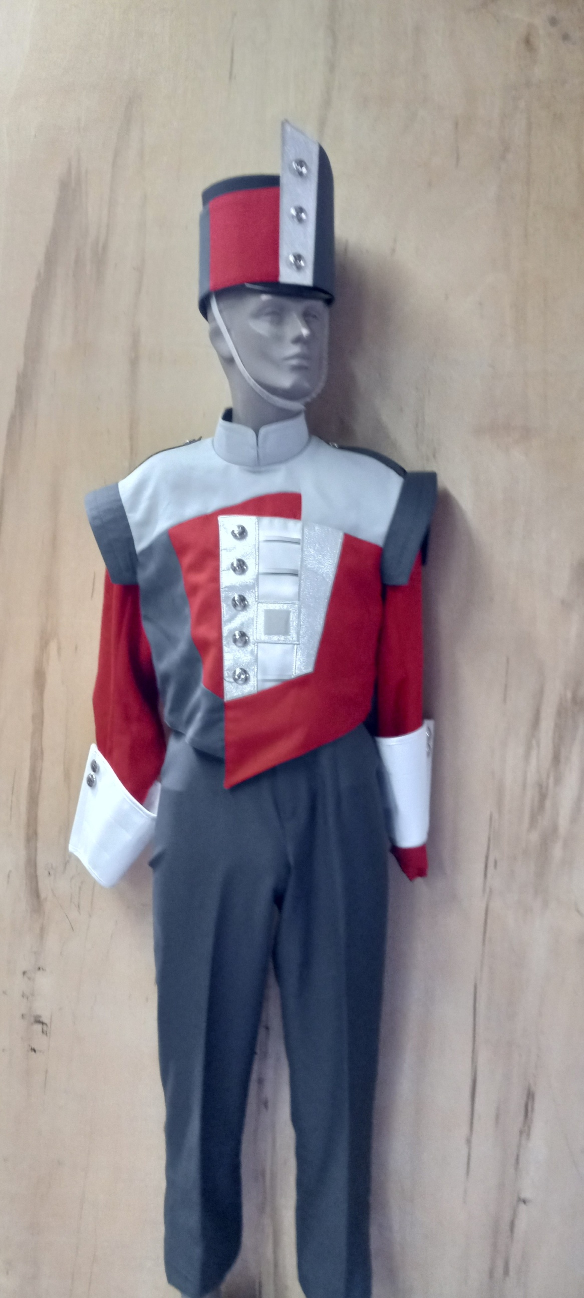 Item#0422GAR350 Item description: 350+/- Sets of Red/White/Gray used band uniforms. Material is cott