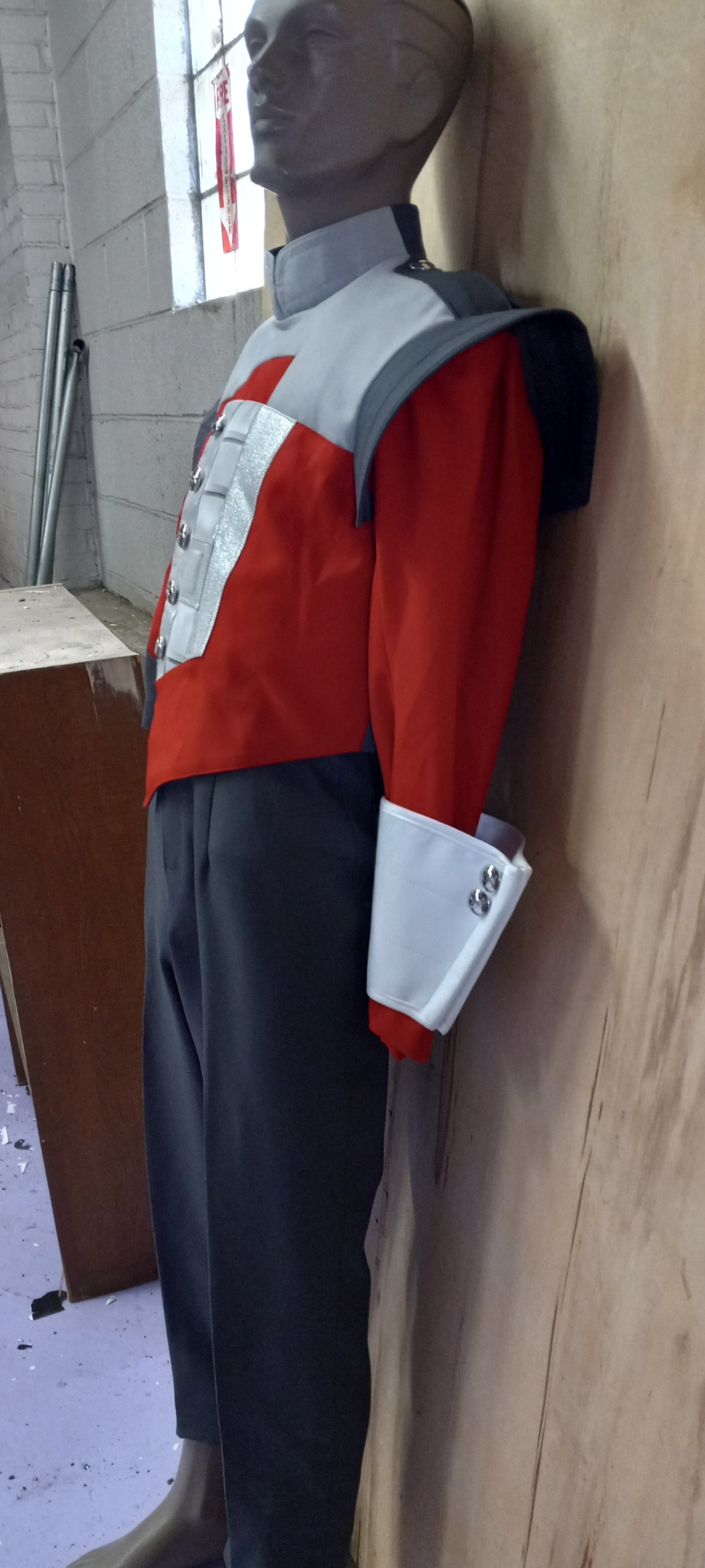 Item#0422GAR350 Item description: 350+/- Sets of Red/White/Gray used band uniforms. Material is cott