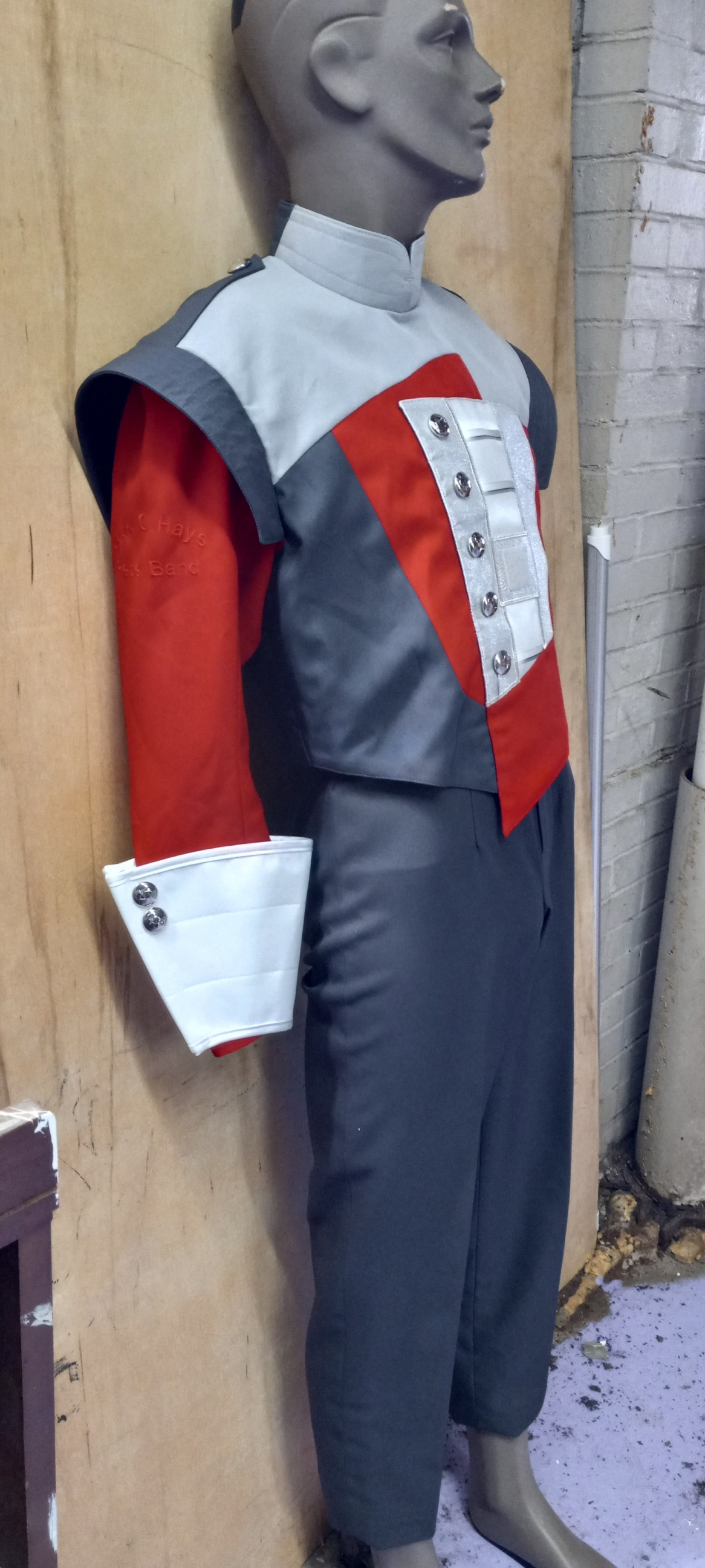 Item#0422GAR350 Item description: 350+/- Sets of Red/White/Gray used band uniforms. Material is cott