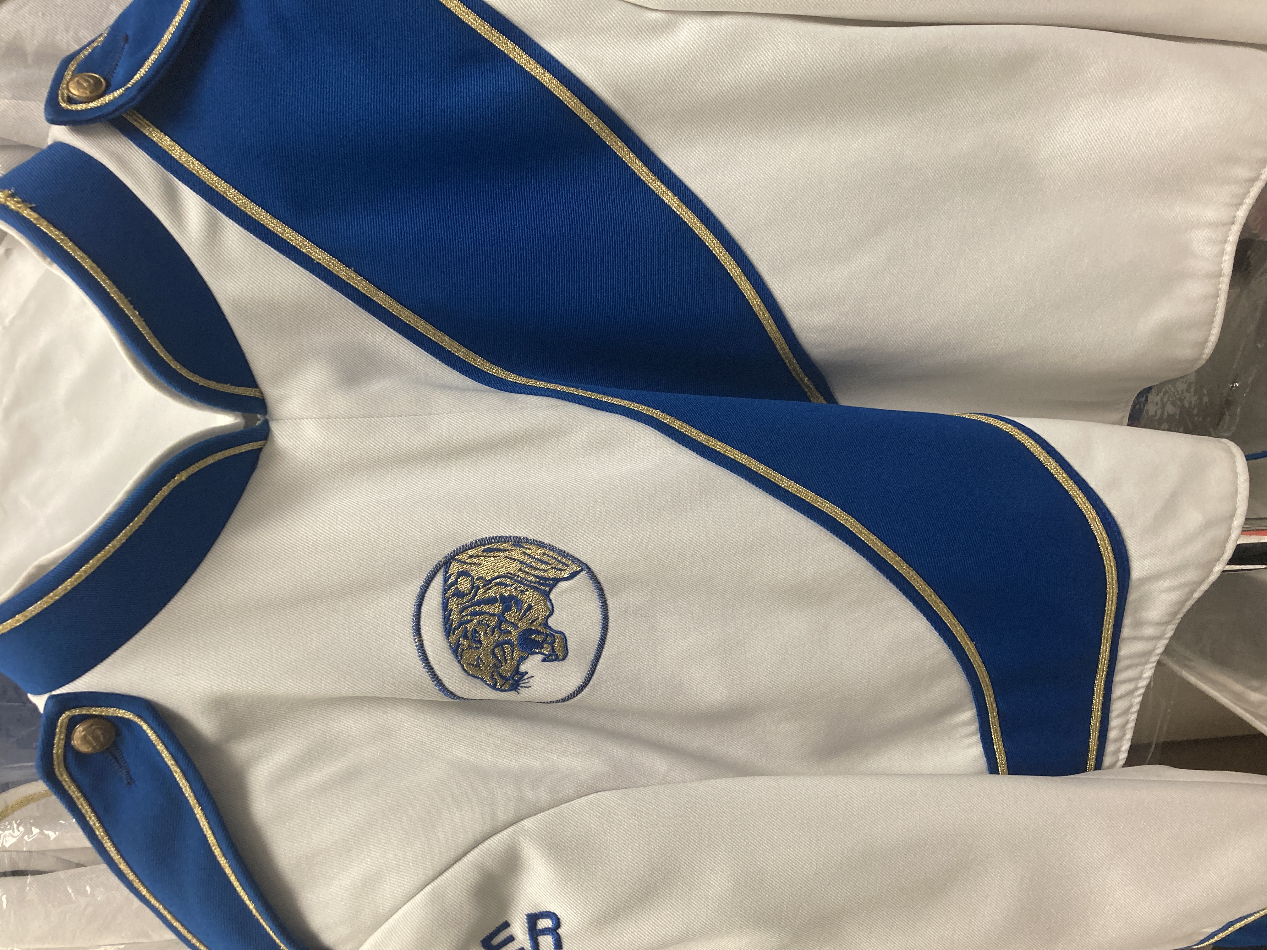 Set of 175 Blue and White Stanbury Marching Band Jackets and Black Fruhauf Bibs Item description: Ja