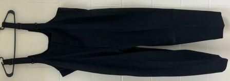 Lot of 65 Black and Gold Marching Band Uniforms Including Helmets and Plumes