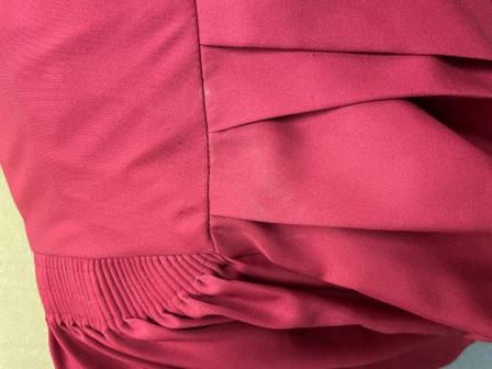 Lot of red choir robes and matching stoles