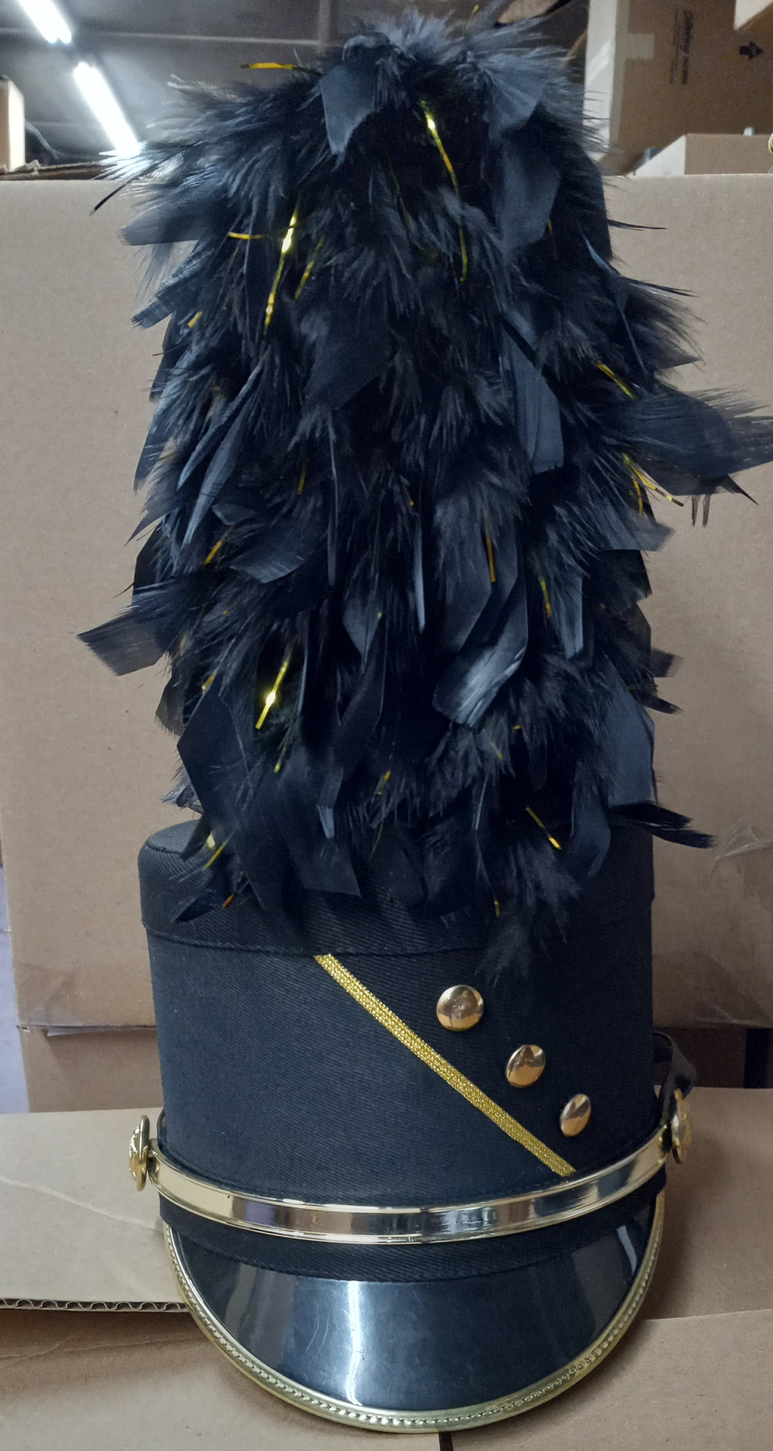9 Black Shakos with gold buttons and hardware (may also be purchased in smaller sets)