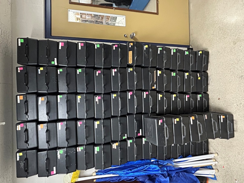 Set of 65 Blue, White and Gold Shakos with Cases